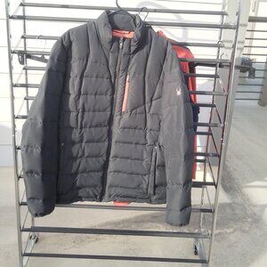 Spyder men's winter coat in black with red lining and accents